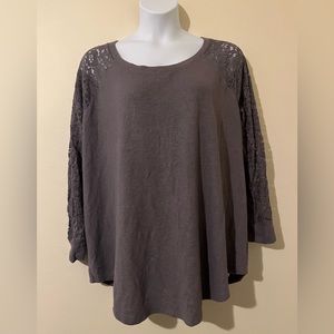 Torrid gray top with lace sleeves.